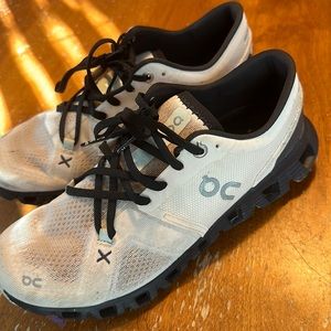 On cloud cloud x sneakers! Tan and black.